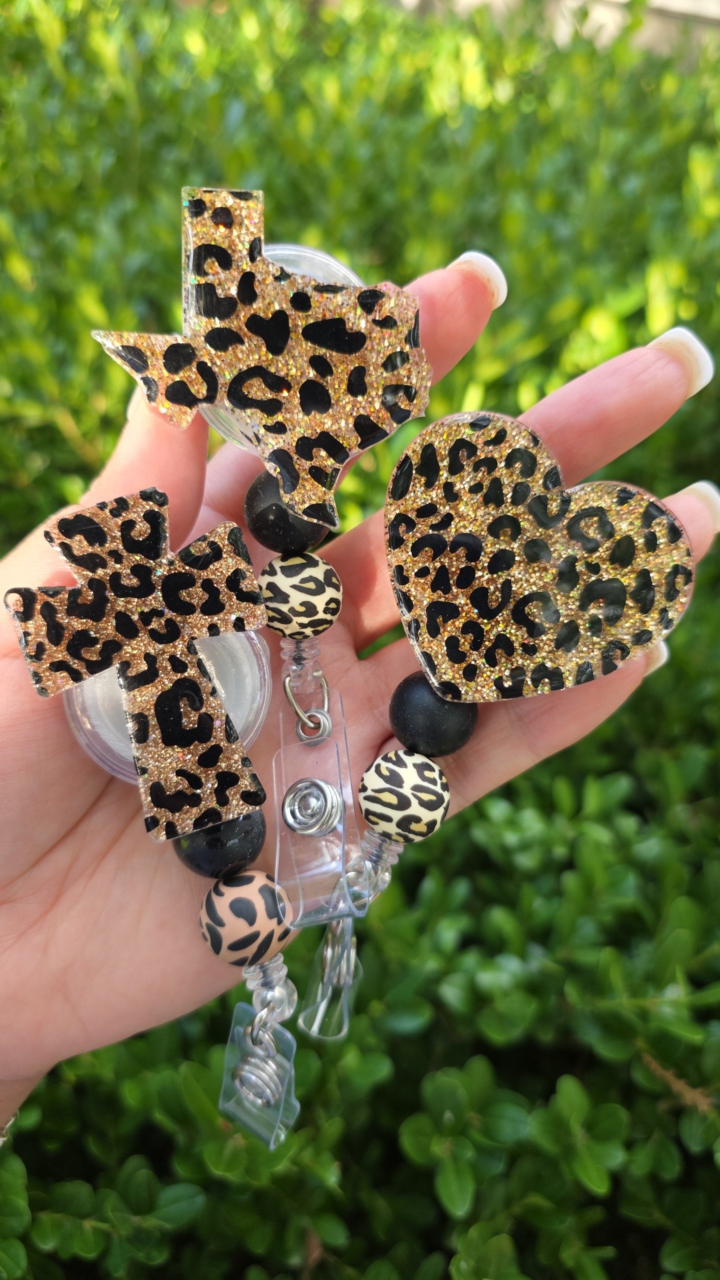 Leopard badge reels