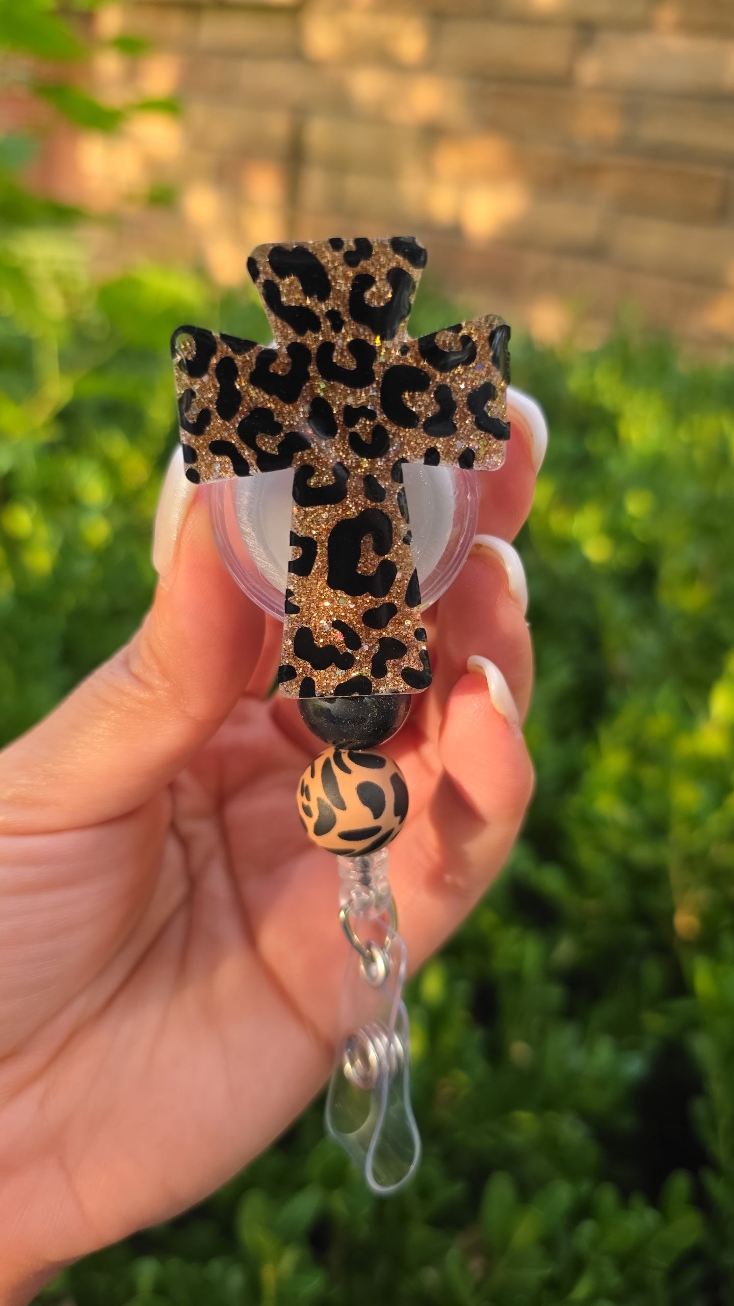 Leopard badge reels