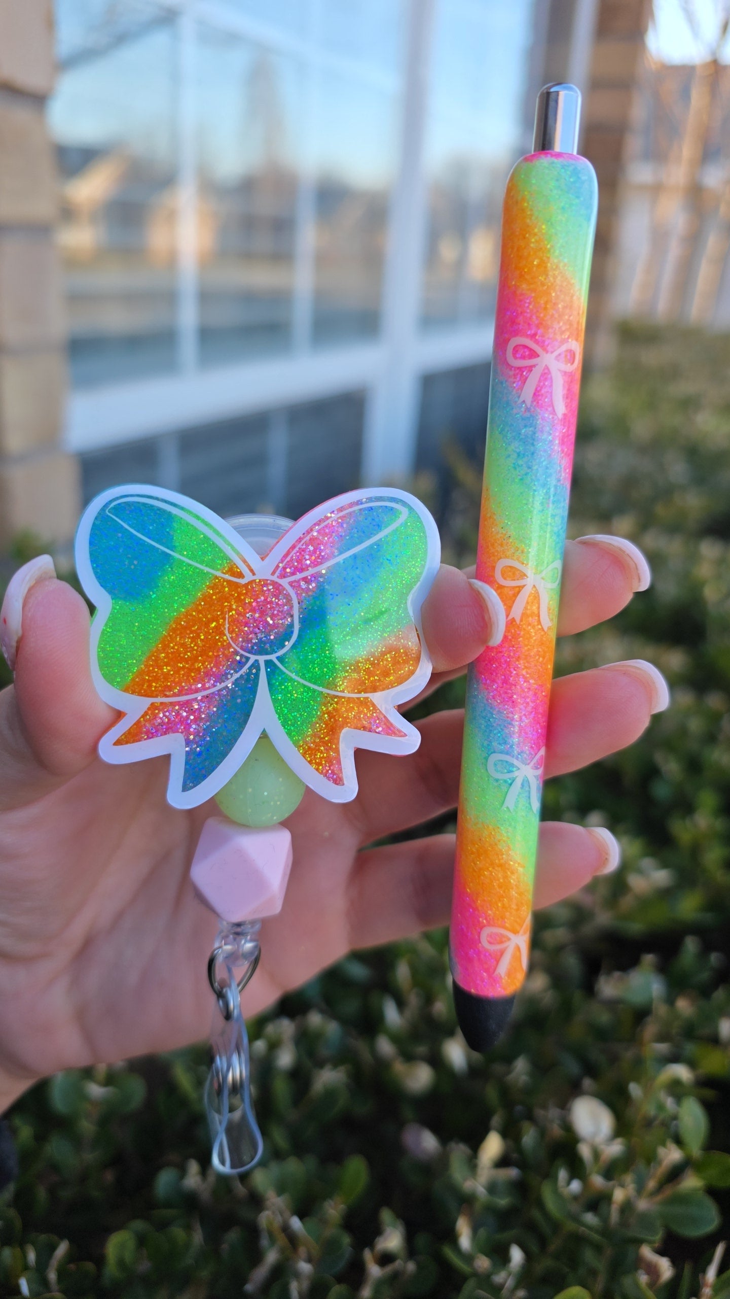 Neon Bow Badge Reel