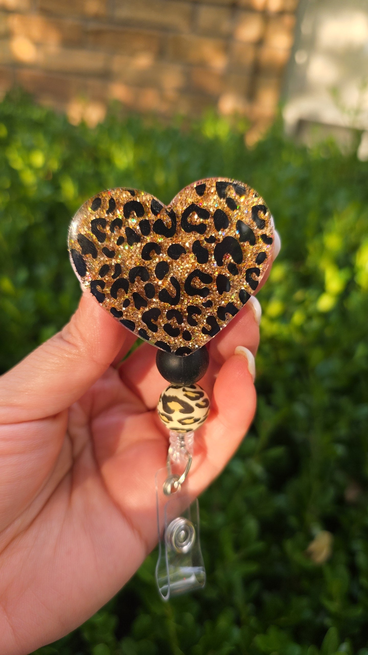Leopard badge reels