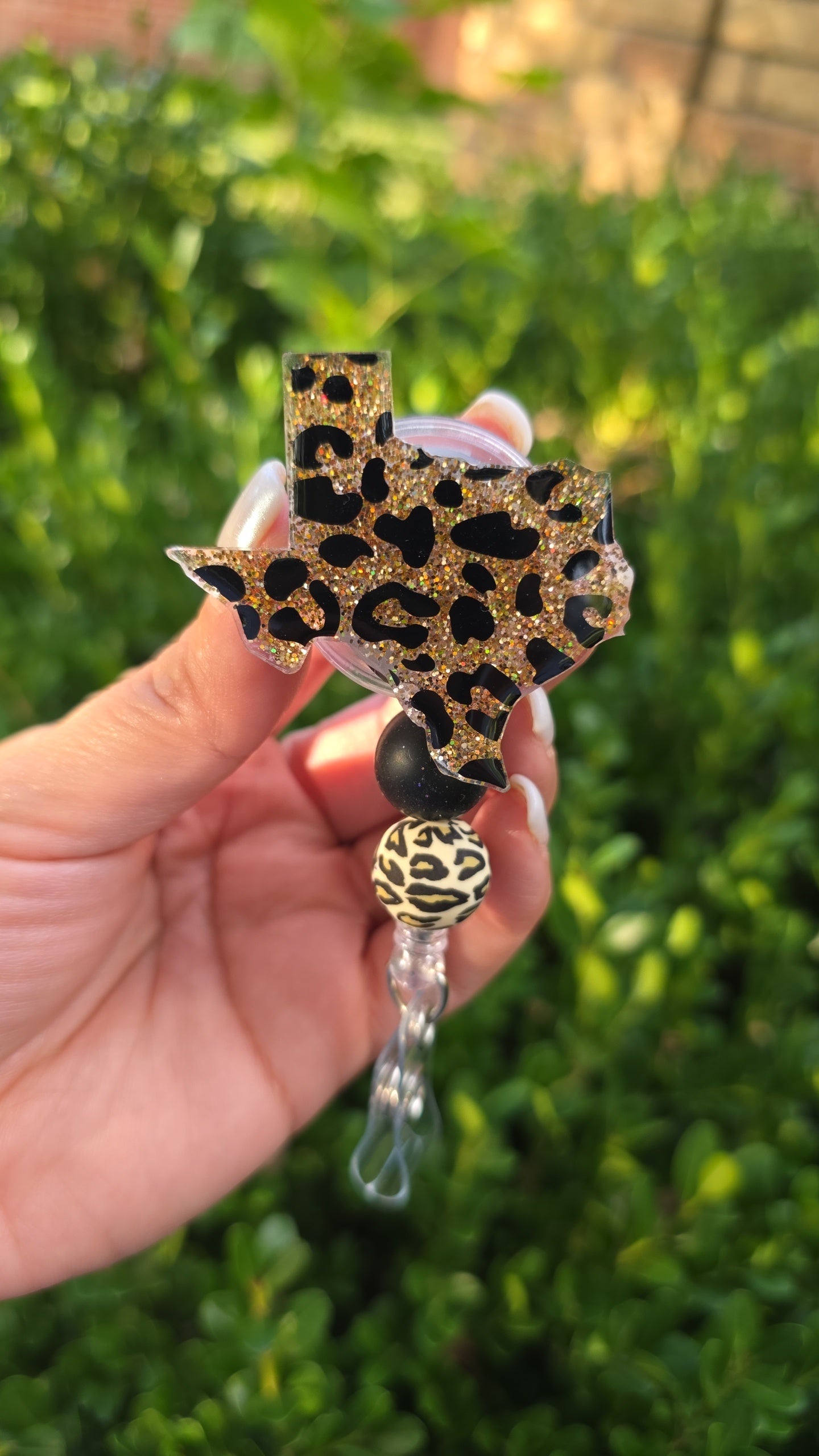 Leopard badge reels